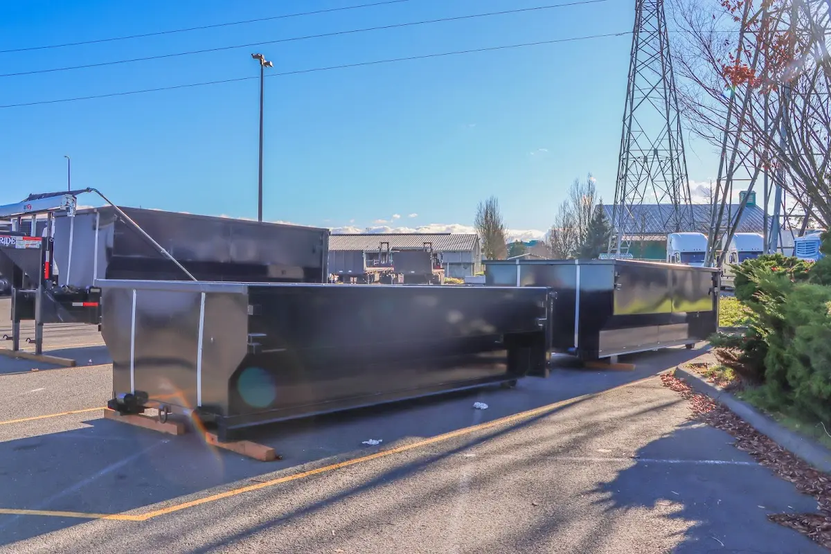 Roll-off dumpster ready for waste disposal at job site for Concrete Dumpster Rental in Grove City